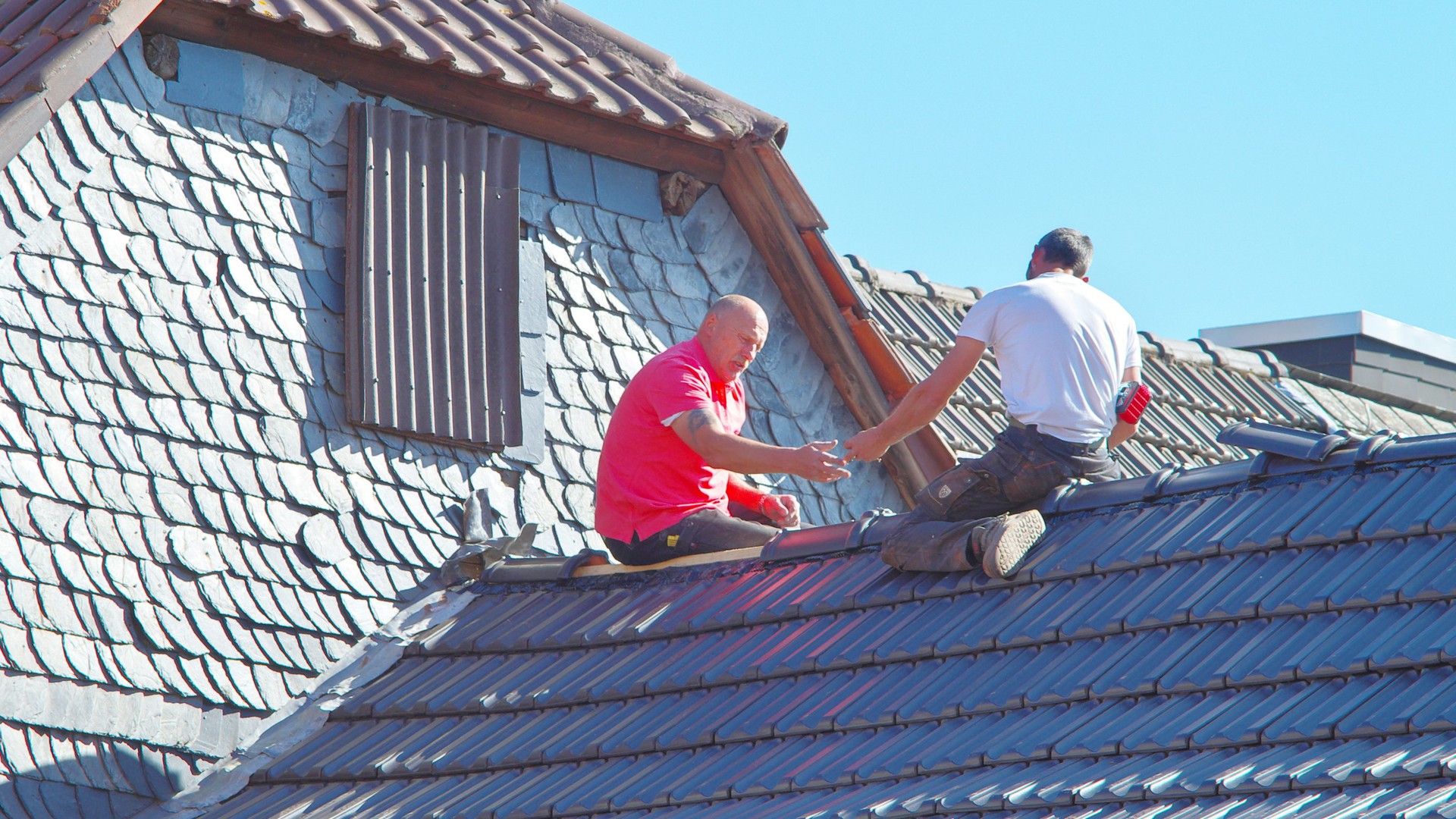 Top Rated Roofers Ltd team at work on a roof repair project